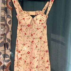 Rumored Cream Dress with Red Floral Accents